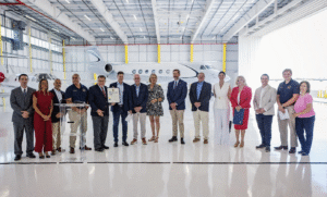Suffolk County Executive Ed Romaine presents a proclamation to Mark Carmen, CEO of Modern Aviation, alongside local airport management and other state and local elected officials in celebration of the ribbon cutting for Modern Aviation’s new hangar and newly renovated FBO at Francis S. Gabreski Airport.